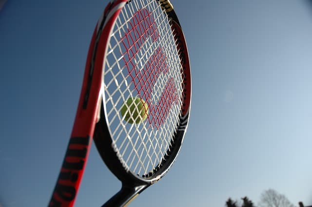 tennis racquet and ball