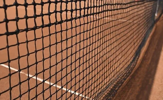 tennis net on clay court